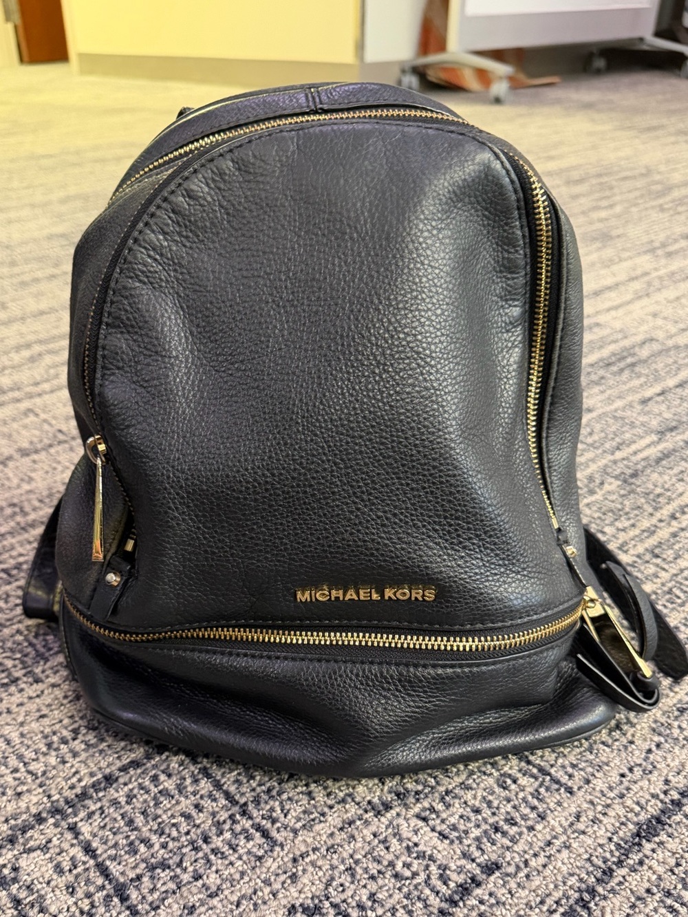 Michael Kors Black Leather Backpack with Gold Accents